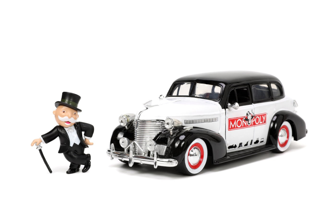 Jada set masinuta metalica chevrolet master deluxe 1939 scara 1:24 si figurina mr monopoly