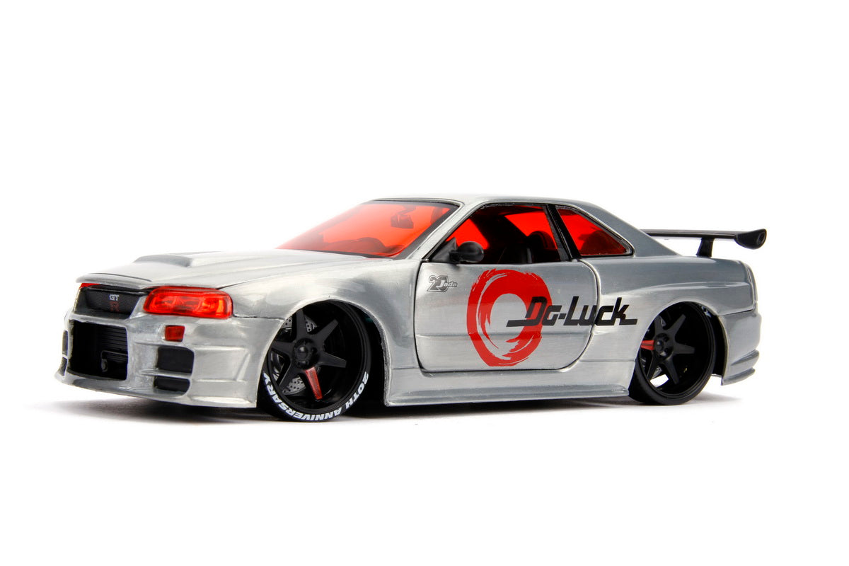 Macheta metalica nissan skyline gtr 2002 scara 1 la 24